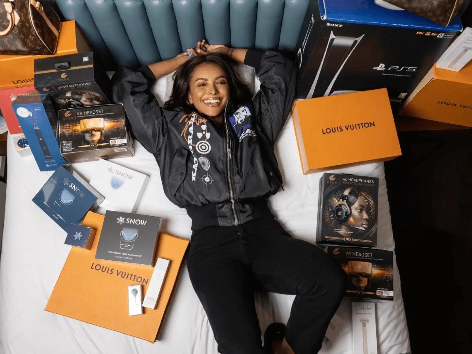 Kat Graham with campaign prizes
