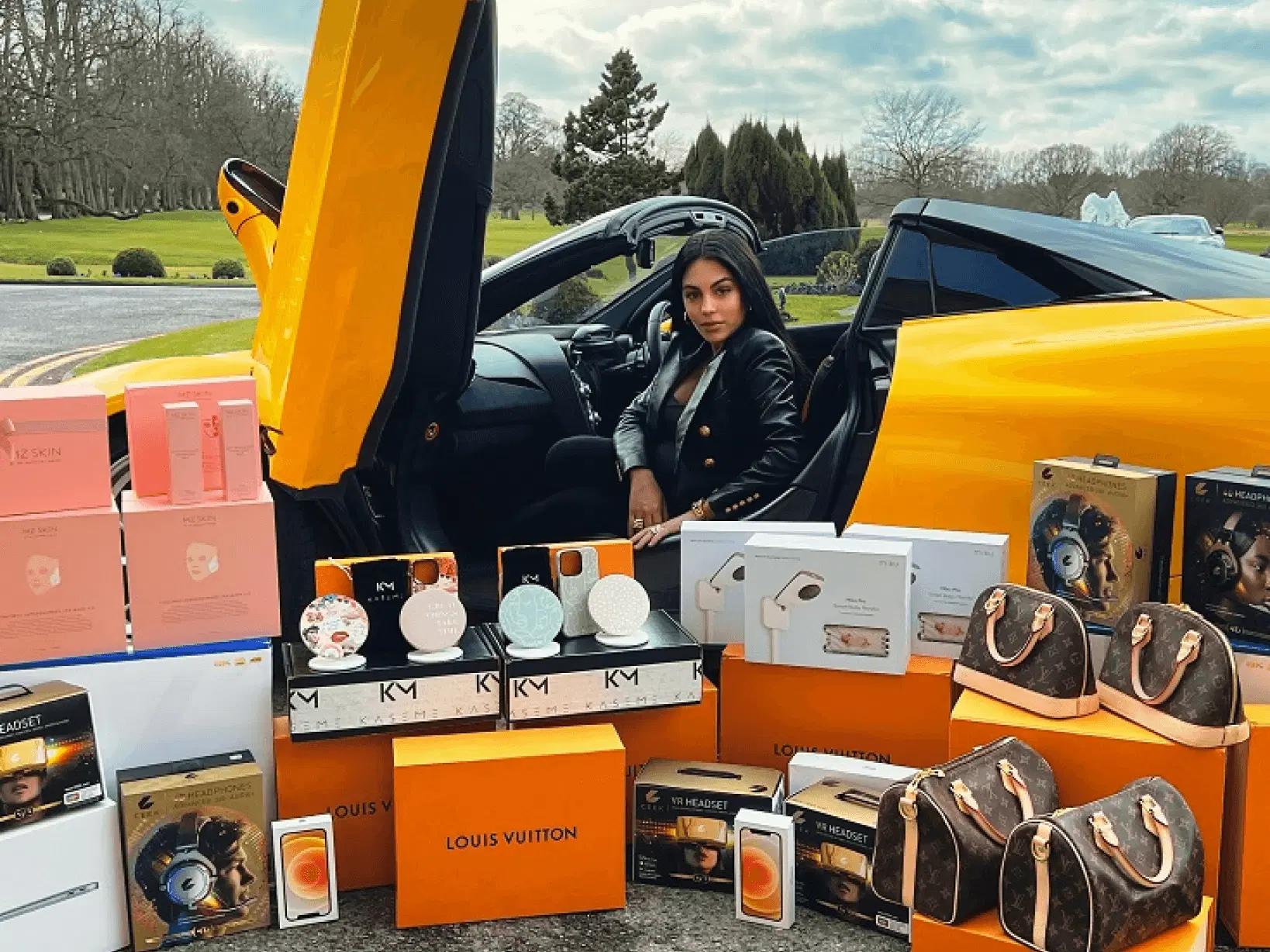 Georgina Rodriguez with campaign prizes and a sports car
